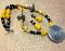 Antique Metal Pendant On Yellow Nuggets & black Beads Necklace Antique Metal Pendant On Yellow Nuggets & black Beads Necklace