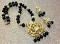 Microplated Gold Mahalakshmi Pendant & Earrings on Blacks Beads Microplated Gold Mahalakshmi Pendant & Earrings on Blacks Beads