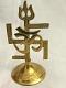 Auspicious Brass OM Symbol, Trishul & Swastika Statue Auspicious Brass OM Symbol, Trishul & Swastika Statue