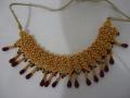 Beautiful Indian Choker in Gold Color With Red Beads Beautiful Indian Choker in Gold Color With Red Beads