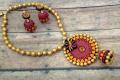 Red and Orange Terracotta Chakra Necklace Jhumka Set Red and Orange Terracotta Chakra Necklace Jhumka Set