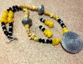 Antique Metal Pendant On Yellow Nuggets & black Beads Necklace Antique Metal Pendant On Yellow Nuggets & black Beads Necklace