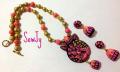 Lovely peacock pendant Set with matching Jhumkas-Pink and Orange Lovely peacock pendant Set with matching Jhumkas-Pink and Orange