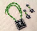 Faux Silver Ganesha Jewelry Set in Clay with Green Crystals Faux Silver Ganesha Jewelry Set in Clay with Green Crystals
