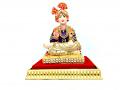 Embellished Lord Swaminarayan Idol in Sitting Position Embellished Lord Swaminarayan Idol in Sitting Position