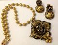 Antique Golden Ganesha Terracotta Set /w Paper Quilled Jhumkas Antique Golden Ganesha Terracotta Set /w Paper Quilled Jhumkas